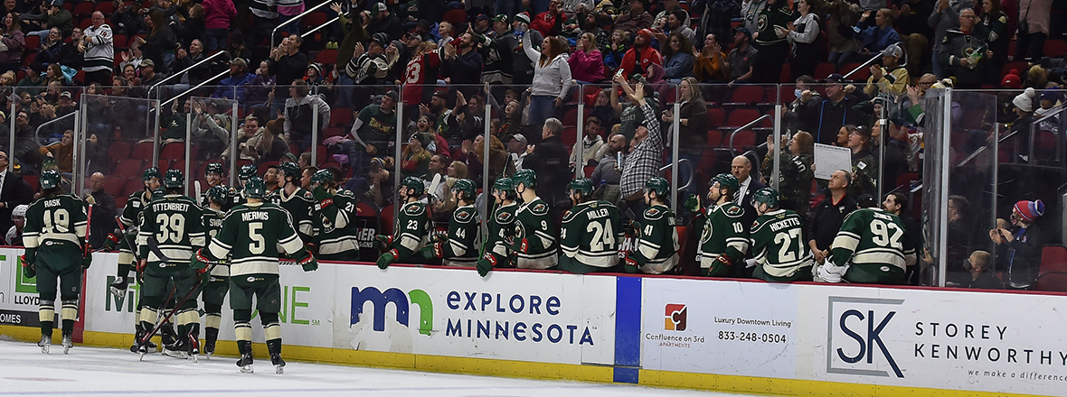 RAU LEADS WILD TO 4-3 VICTORY OVER ICEHOGS