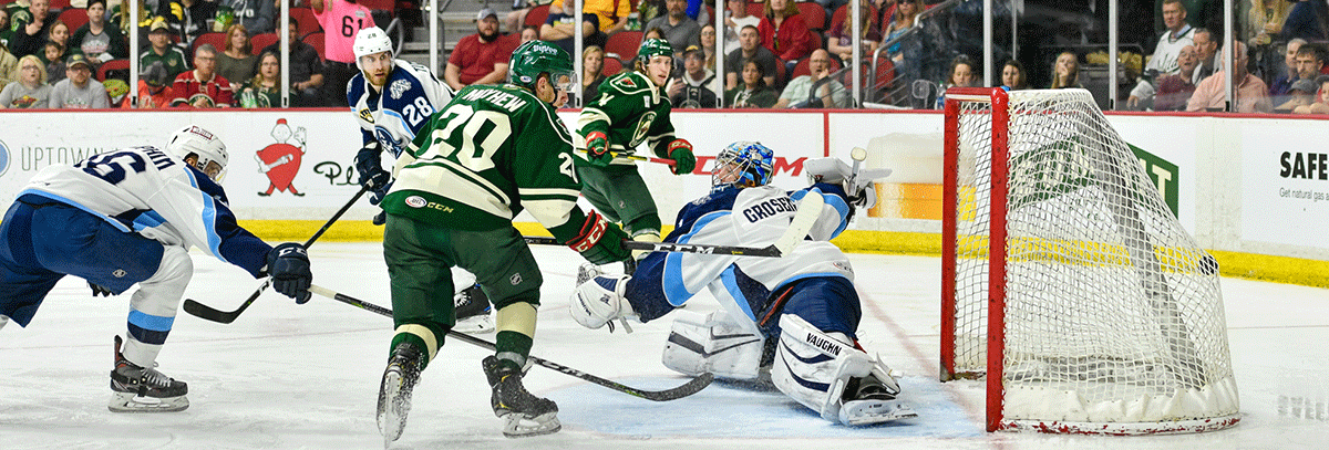 WILD SAVOR FIRST PLAYOFF VICTORY, FOR AT LEAST ONE NIGHT