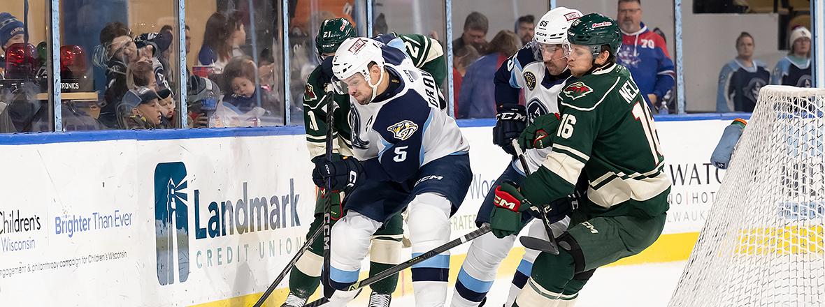 MILWAUKEE HANDS IOWA 7-2 DEFEAT 